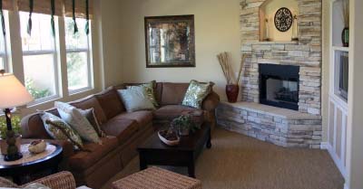 A livingroom heated by a Comfort Furnace
