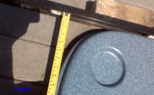 A level extends a straight spa edge while a tape measures the corner radius.